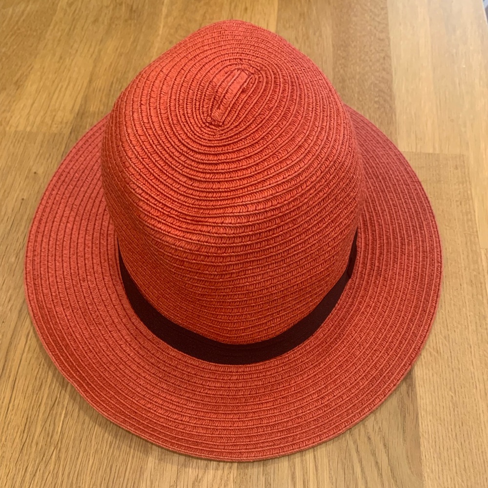 The Hatter Company orange floppy beach hat.
